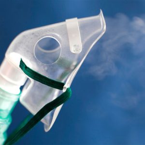 Close-up of a nebulizer in use during stem cell therapy sessions
