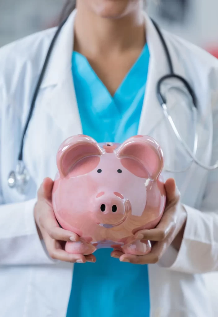 Doctor highlighting medical expenses and savings options