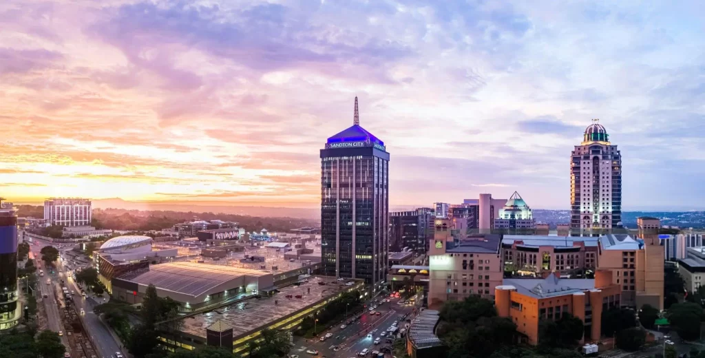 Sandton City skyline at sunset—highlighting South Africa’s modern infrastructure and appeal as a stem cell therapy destination