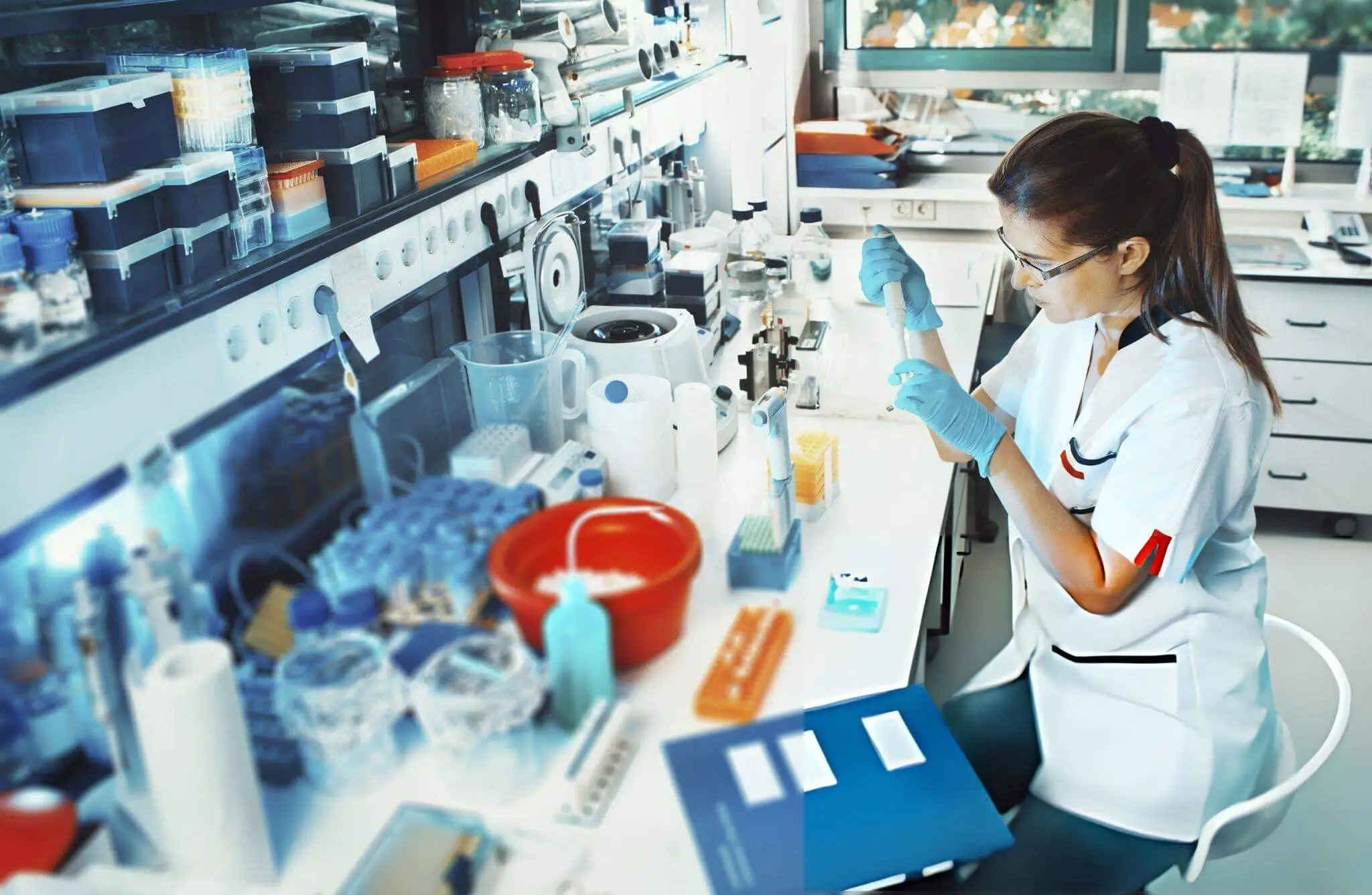 Tray of test tubes and centrifuge—representing stem cell exosome preparation for tissue repair and regenerative signaling